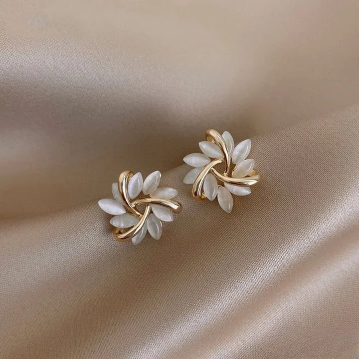 Elegant Gold Earrings with Fine Opal Flower Motifs.
