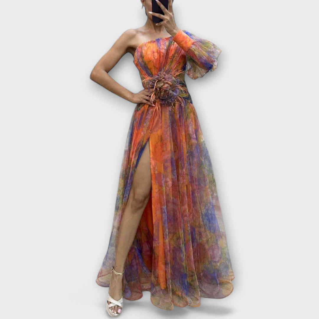 Elegant evening dress with one shoulder strap and tailored cut